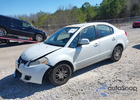 2012 Suzuki Sx4 Le/Le Popular z USA, uszkodzony, nr VIN JS2YC5A38C6300425